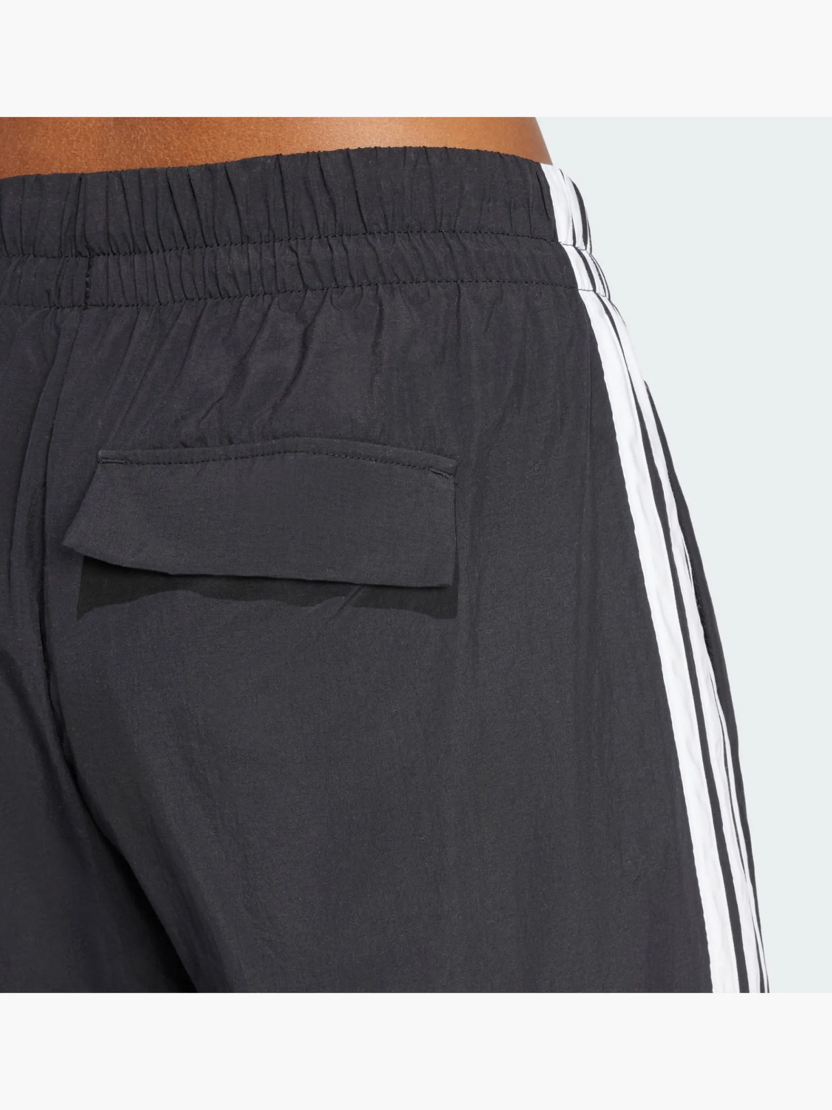 Damen adidas Essentials 3-Streifen Lifestyle Woven Parachute Hose